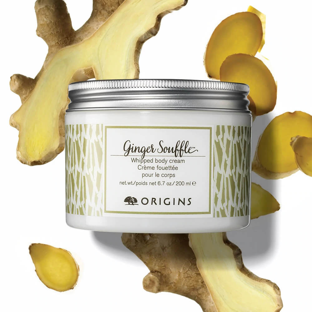 Origins Ginger Souffle Whipped Body Cream 90 ml  ส่วนผสมของน้ำมันมะกอก น้ำมันจากเมล็ดองุ่น น้ำมันรำข้าวและน้ำมันแอปริคอต ให้ความชุ่มชื้นเนียนนุ่มแก่ผิว   ในขณะที่กลิ่นหอมหวานเย้ายวนด้วยน้ำมันหอมระเหยผสมผสานของขิง เลมอน ไลม์ มะกรูด เกรปฟรุตและกานพลู ให้ความรู้สึกหอมสดชื่นทั่วทั้งผิวกาย